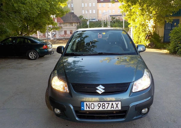 Suzuki SX4 cena 26900 przebieg: 49500, rok produkcji 2009 z Miastko małe 277